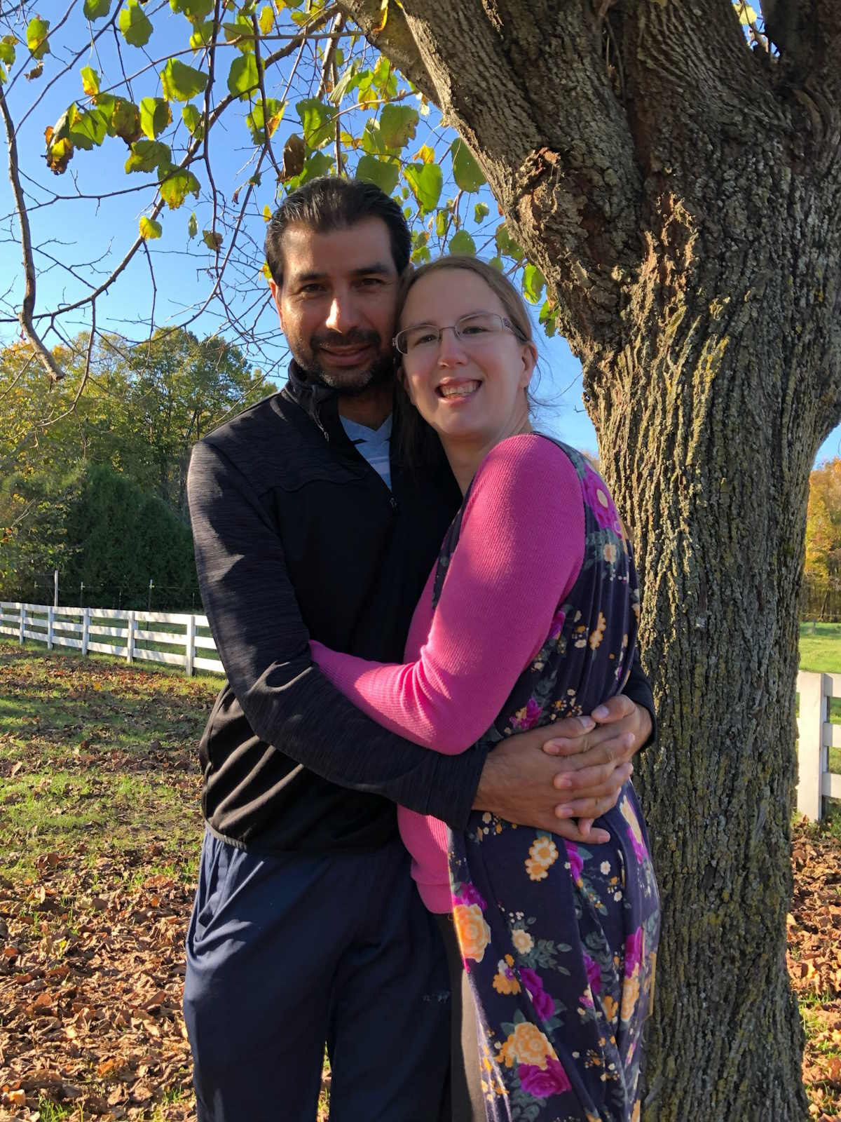 husband and wife hugging