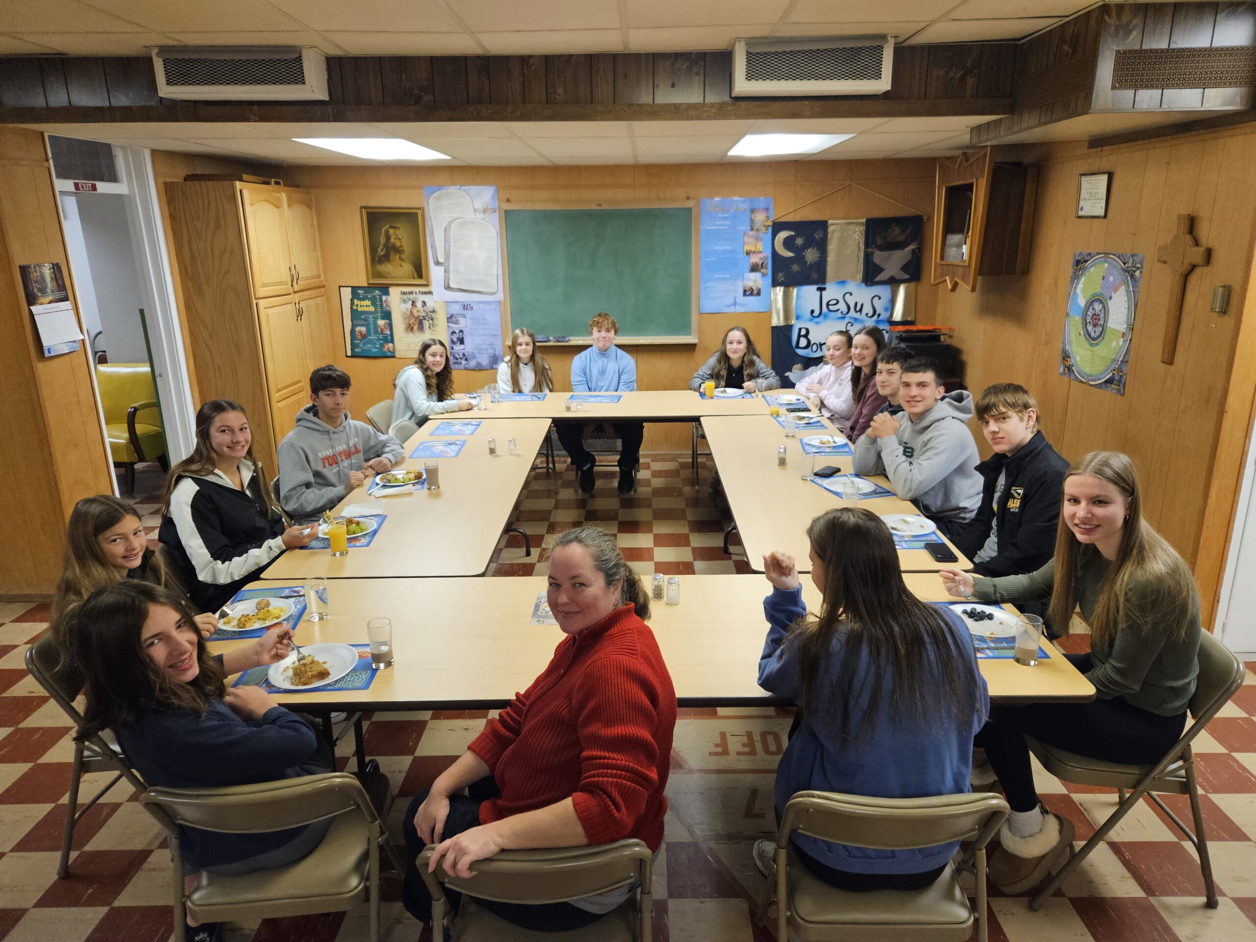 Group of young people eating breakfast